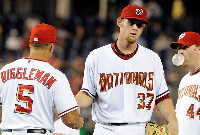 WASHINGTON - AUGUST 10:  Stephen Strasburg #37 of the Washington Nationals hands the ball to manager Jim Riggleman after being removed from the game in the fifth inning against the Florida Marlins at Nationals Park on August 10, 2010 in Washington, DC.  (Photo by Greg Fiume/Getty Images)