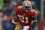 SAN FRANCISCO - DECEMBER 27:  Frank Gore #21 of the San Francisco 49ers runs against the Detroit Lions during an NFL game at Candlestick Park on December 27, 2009 in San Francisco, California.  (Photo by Jed Jacobsohn/Getty Images)