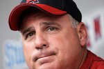 ANAHEIM, CA - APRIL 10:  Mike Scioscia #14 manager of the Los Angeles Angels reflects on pitcher Nick Adenhart's death as he answers questions in the dugout at Angel Stadium April 10, 2009 in Anaheim, California. Adenhart and two others were killed in car crash on April 9.  (Photo by Kevork Djansezian/Getty Images)