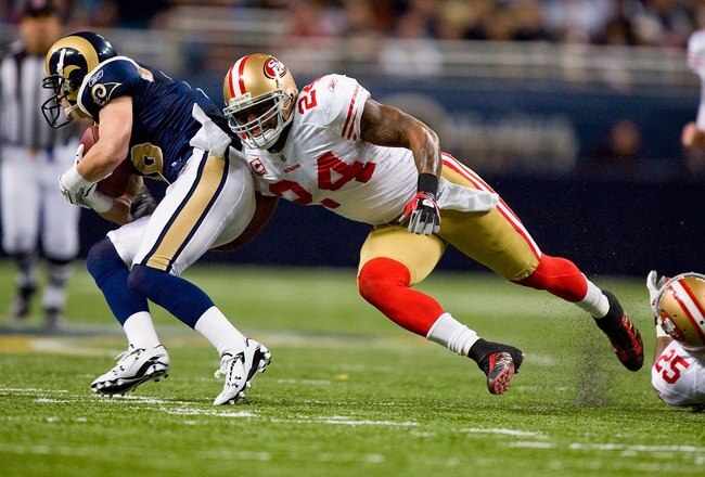 ST. LOUIS - JANUARY 3: Michael Robinson #24 of the San Francisco 49ers moves to tackle Danny Amendola #16 of the St. Louis Rams at the Edward Jones Dome on January 3, 2010 in St. Louis, Missouri.  The 49ers beat the Rams 28-6.  (Photo by Dilip Vishwanat/Getty Images)