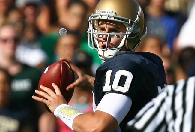 SOUTH BEND, IN - SEPTEMBER 19: Dayne Crist #10 of the Notre Dame Fighting Irish looks for a receiver against the Michigan State Spartans on September 19, 2009 at Notre Dame Stadium in South Bend, Indiana. Notre Dame defeated Michigan State 33-30. (Photo by Jonathan Daniel/Getty Images)