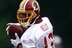ASHBURN, VA - JULY 29:  Wide Receive Malcom Kelly #12 of the Washington Redskins catches a pass during drills on the first day of training camp July 29, 2010 in Ashburn, Virginia.  (Photo by Win McNamee/Getty Images)