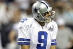 HOUSTON - AUGUST 28: Quarterback Tony Romo #9 of the Dallas Cowboys encourages his offensive line after a penalty was called on the play during a football game against the Houston Texans at Reliant Stadium on August 28, 2010 in Houston, Texas. Houston won 23-7. (Photo by Bob Levey/Getty Images)
