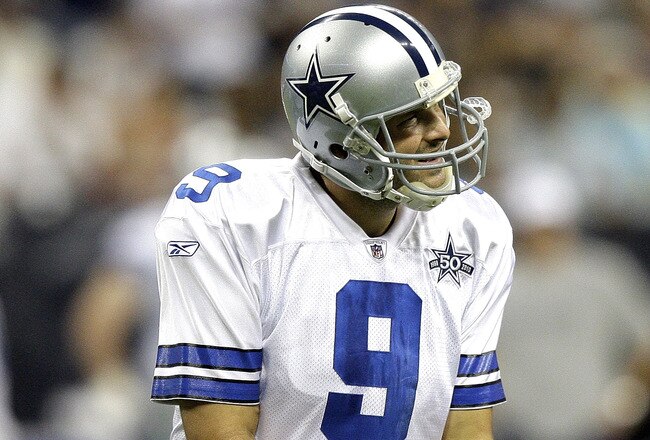 HOUSTON - AUGUST 28: Quarterback Tony Romo #9 of the Dallas Cowboys encourages his offensive line after a penalty was called on the play during a football game against the Houston Texans at Reliant Stadium on August 28, 2010 in Houston, Texas. Houston won 23-7. (Photo by Bob Levey/Getty Images)