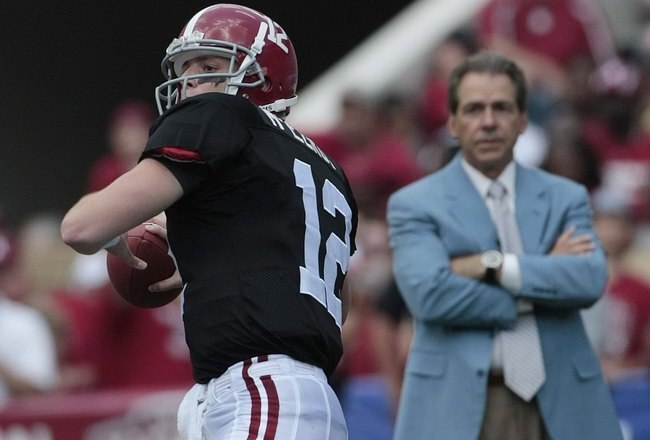TUSCALOOSA, AL - APRIL 17:  Coach Nick Saban of the Alabama Crimson Tide watches quarterback Greg McElroy #12 throw during the Alabama spring game at Bryant Denny Stadium on April 17, 2010 in Tuscaloosa, Alabama. (Photo by Dave Martin/Getty Images)