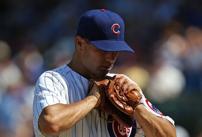 CHICAGO - JULY 21: Starting pitcher Ted Lilly #30 of the Chicago Cubs reacts as he leaves a game against the Houston Astros in the 8th inning at Wrigley Field on July 21, 2010 in Chicago, Illinois. The Astros defeated the Cubs 4-3 in 12 innings. (Photo by Jonathan Daniel/Getty Images)