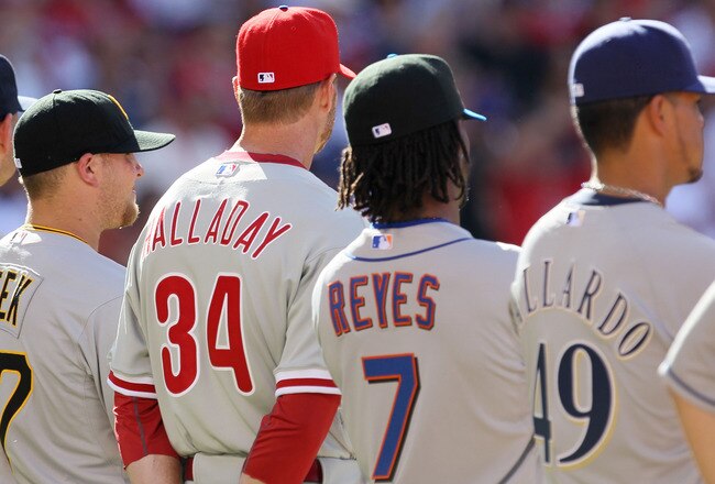 ANAHEIM, CA - JULY 13:  (L) National League All-Star pitcher Evan Meek stands with his teammates prior to the 81st MLB All-Star Game at Angel Stadium of Anaheim on July 13, 2010 in Anaheim, California.  (Photo by Stephen Dunn/Getty Images)