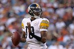 DENVER - AUGUST 29:  Quarterback Dennis Dixon #10 of the Pittsburgh Steelers scrambles against the Denver Broncos during preseason NFL action at INVESCO Field at Mile High on August 29, 2010 in Denver, Colorado.  (Photo by Doug Pensinger/Getty Images)