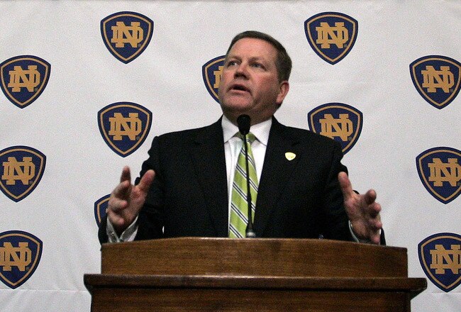 SOUTH BEND, IN - DECEMBER 11: Brian Kelly attends a press conference where he was named new football head coach at Notre Dame University on December 11, 2009 in South Bend, Indiana.  Kelly most recently led the University of Cincinnati to two consecutive Bowl Championship Series appearances including a perfect 12-0 record this past season. (Photo by Frank Polich/Getty Images)