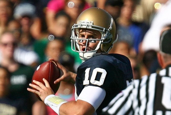 SOUTH BEND, IN - SEPTEMBER 19: Dayne Crist #10 of the Notre Dame Fighting Irish looks for a receiver against the Michigan State Spartans on September 19, 2009 at Notre Dame Stadium in South Bend, Indiana. Notre Dame defeated Michigan State 33-30. (Photo by Jonathan Daniel/Getty Images)