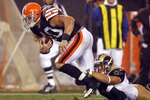 CLEVELAND - AUGUST 21:  Chris Chamberlain #57 of the St. Louis Rams tackles Peyton Hillis #40 of the Cleveland Browns at Cleveland Browns Stadium on August 21, 2010 in Cleveland, Ohio.  (Photo by Matt Sullivan/Getty Images)