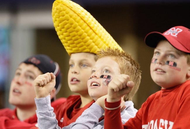 ARLINGTON, TX - DECEMBER 5: Young fans of the Nebraska Cornhuskers watch the game against the Texas Longhorns at Cowboys Stadium on December 5, 2009 in Arlington, Texas. (Photo by Jamie Squire/Getty Images)