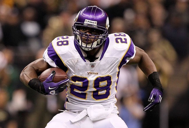 NEW ORLEANS - JANUARY 24:  Adrian Peterson #28 of the Minnesota Vikings runs with the ball against the New Orleans Saints during the NFC Championship Game at the Louisiana Superdome on January 24, 2010 in New Orleans, Louisiana. The Saints won 31-28 in overtime. (Photo by Jed Jacobsohn/Getty Images)
