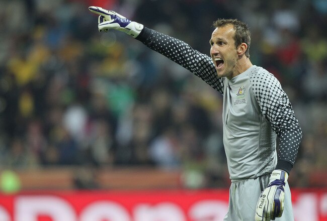 NELSPRUIT, SOUTH AFRICA - JUNE 23:  Mark Schwarzer of Australia directs his defence during the 2010 FIFA World Cup South Africa Group D match between Australia and Serbia at Mbombela Stadium on June 23, 2010 in Nelspruit, South Africa.  (Photo by Christof Koepsel/Getty Images)
