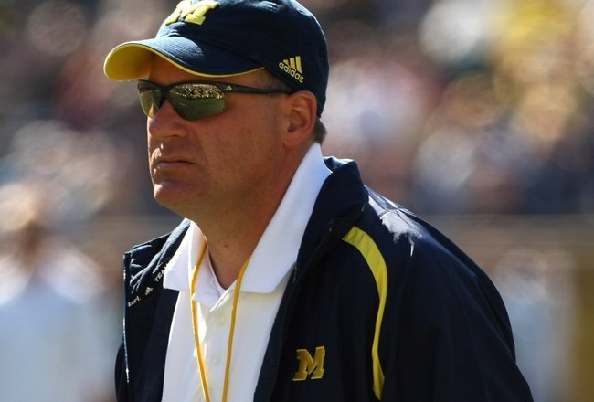 ANN ARBOR, MI - SEPTEMBER 19:  Head coach Rich Rodriguez of the Michigan Wolverines watches warmups before the game with the Eastern Michigan Eagles at Michigan Stadium on September 19, 2009 in Ann Arbor, Michigan.  Michigan won 45-17.  (Photo by Stephen Dunn/Getty Images)