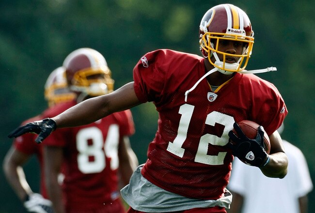 ASHBURN, VA - JULY 30:  Washington Redskins wide receiver Malcom Kelly (#12) catches a pass during drills on opening day of training camp July 30, 2009 in Ashburn, Virginia.  (Photo by Win McNamee/Getty Images)