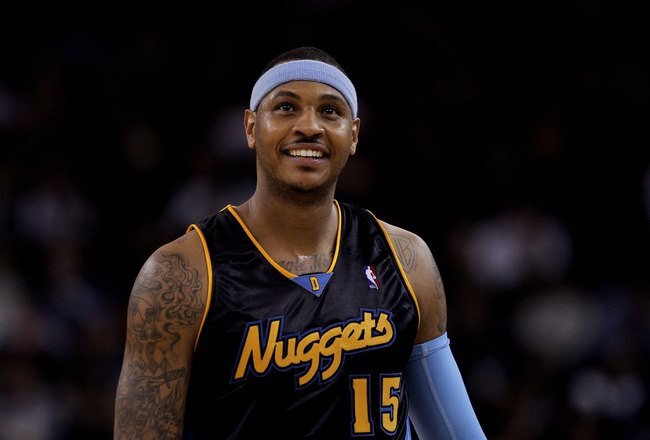 OAKLAND, CA - JANUARY 20:  Carmelo Anthony #15 of the Denver Nuggets stands on the court during their game against the Golden State Warriors at Oracle Arena on January 20, 2010 in Oakland, California.  NOTE TO USER: User expressly acknowledges and agrees that, by downloading and/or using this Photograph, user is consenting to the terms and conditions of the Getty Images License Agreement.  (Photo by Ezra Shaw/Getty Images)