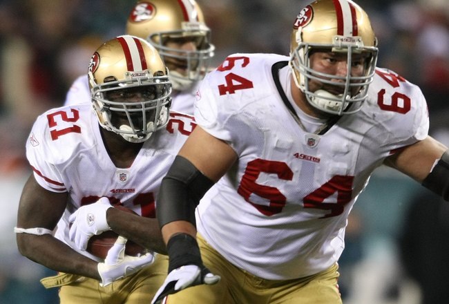 PHILADELPHIA - DECEMBER 20:  Frank Gore #21 of the San Francisco 49ers rushes against the Philadelphia Eagles at Lincoln Financial Field on December 20, 2009 in Philadelphia, Pennsylvania.  (Photo by Nick Laham/Getty Images)
