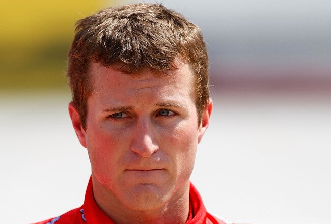 BRISTOL, TN - AUGUST 20: Kasey Kahne, driver of the #9 Budweiser Ford, stands in the garage area during practice for the NASCAR Sprint Cup Series IRWIN Tools Night Race at Bristol Motor Speedway on August 20, 2010 in Bristol, Tennessee.  (Photo by Geoff Burke/Getty Images for NASCAR)