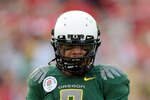 PASADENA, CA - JANUARY 01:  Quarterback Jeremiah Masoli #8 of the Oregon Ducks celebrates after scoring a touchdown against the Ohio State Buckeyes in the 96th Rose Bowl game on January 1, 2010 in Pasadena, California.  (Photo by Kevork Djansezian/Getty Images)