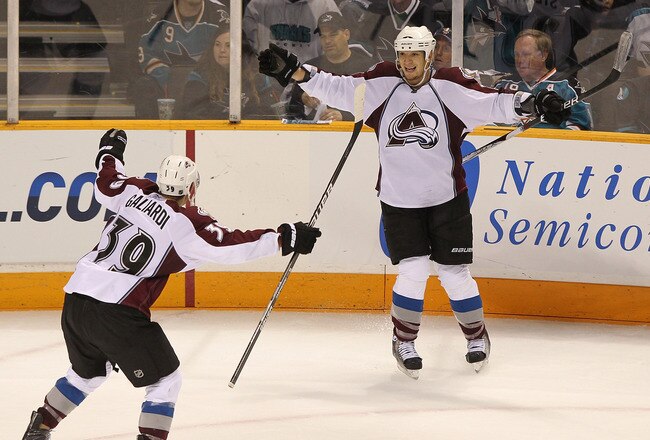 SAN JOSE, CA - APRIL 14:  Chris Stewart #25 of the Colorado Avalanche celebrates with teammate T.J. Galiardi #39 after scoring the game winning goal against the San Jose Sharks  in Game One of the Western Conference Quarterfinals during the 2010 NHL Stanley Cup Playoffs at HP Pavilion on April 14, 2010 in San Jose, California. (Photo by Jed Jacobsohn/ Getty Images)