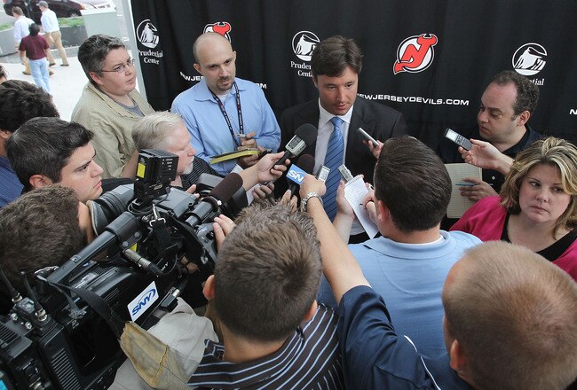 NEWARK, NJ - JULY 20: Ilya Kovalchuk of the New Jersey Devils speaks with the media after announcing his contract renewal at the Prudential Center on July 20, 2010 in Newark, New Jersey. (Photo by Bruce Bennett/Getty Images)
