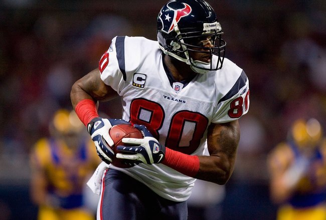 ST. LOUIS - DECEMBER 20:  Andre Johnson #80 of the Houston Texans carries the ball during the game against the St. Louis Rams at Edward Jones Dome on December 20, 2009 in St. Louis, Missouri.  (Photo by Dilip Vishwanat/Getty Images)