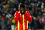 JOHANNESBURG, SOUTH AFRICA - JULY 02:  Asamoah Gyan of Ghana looks dejected after missing his penalty during the 2010 FIFA World Cup South Africa Quarter Final match between Uruguay and Ghana at the Soccer City stadium on July 2, 2010 in Johannesburg, South Africa.  (Photo by Cameron Spencer/Getty Images)
