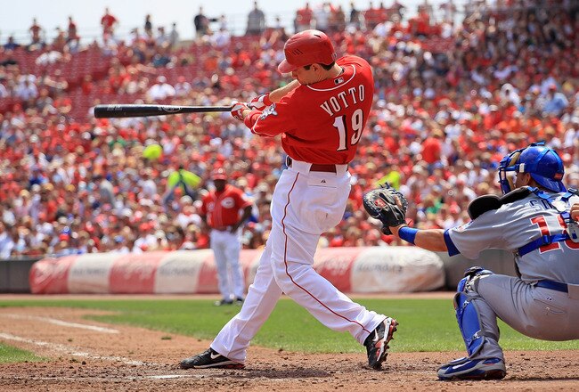 CINCINNATI - AUGUST 29:  Joey Votto #19 of the Cincinnati Reds hits a single during the game against the Chicago Cubs at Great American Ball Park on August 29, 2010 in Cincinnati, Ohio.  (Photo by Andy Lyons/Getty Images)