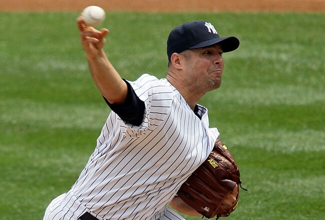 NEW YORK - AUGUST 21: Javier Vazquez #31 of the New York Yankees delivers a pitch against the Seattle Mariners on August 21, 2010 at Yankee Stadium in the Bronx borough of New York City.   (Photo by Jim McIsaac/Getty Images)
