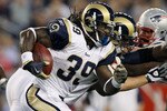 FOXBORO, MA - AUGUST 26:  Steven Jackson #29 of the St. Louis Rams carries the ball in the first quarter against the New England Patriots on August 26, 2010 at Gillette Stadium in Foxboro, Massachusetts.  (Photo by Elsa/Getty Images)