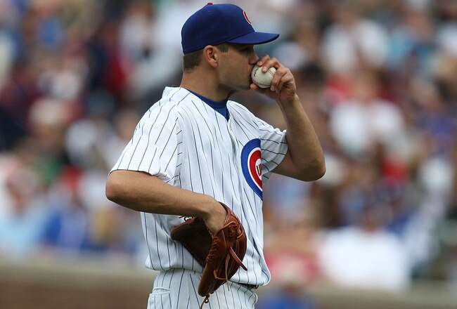 CHICAGO - MAY 29: Starting pitcher Ted Lilly #30 of the Chicago Cubs reacts after giving up a solo home run to Matt Kemp of the Los Angeles Dodgers in the 7th inning on May 29, 2009 at Wrigley Field in Chicago, Illinois. The Cubs defeated the Dodgers 2-1. (Photo by Jonathan Daniel/Getty Images)