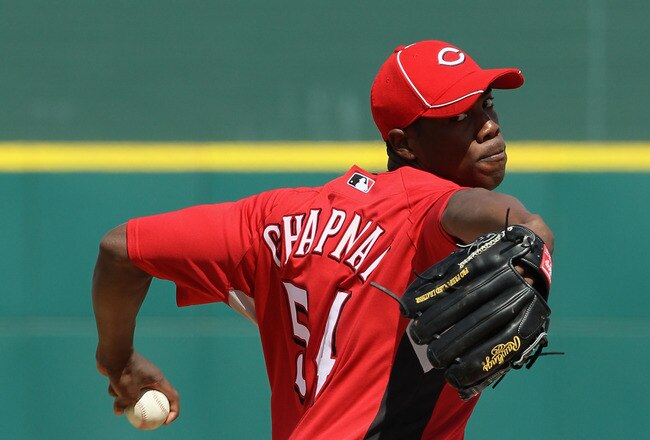 GOODYEAR, AZ - MARCH 08:  Relief pitcher Aroldis Chapman #54 of the Cincinnati Reds pitches against the Kansas City Royals during the MLB spring training game at Goodyear Ballpark on March 8, 2010 in Goodyear, Arizona.  (Photo by Christian Petersen/Getty Images)