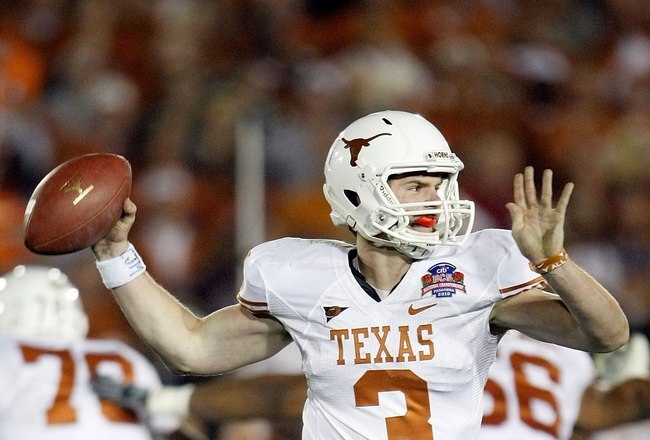 PASADENA, CA - JANUARY 07:  Quarterback Garrett Gilbert #3 of the Texas Longhorns drops back to pass against the Alabama Crimson Tide during the Citi BCS National Championship game at the Rose Bowl on January 7, 2010 in Pasadena, California.  (Photo by Jeff Gross/Getty Images)