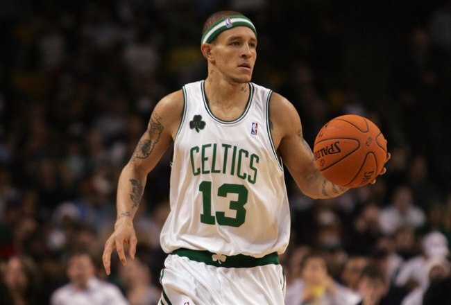 BOSTON - DECEMBER 08:  Delonte West #13 of the Boston Celtics brings the ball upcourt against the Phoenix Suns during the game on December 8, 2006 at the TD Banknorth Garden in Boston, Massachusetts.  The Suns won 116-111. NOTE TO USER: User expressly acknowledges and agrees that, by downloading and or using this photograph, User is consenting to the terms and conditions of the Getty Images License Agreement. (Photo by Elsa/Getty Images)