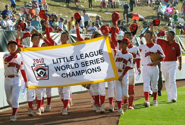SOUTH WILLAMSPORT, PA - AUGUST 29:  Team Japan rounds the ball park and wave to the crowd after their 4-1 victory over the United States to win the Little League World Series Championship on August 29, 2010 in South Willamsport, Pennsylvania.  (Photo by Drew Hallowell/Getty Images)
