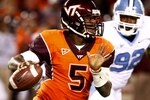BLACKSBURG, VA - OCTOBER 29:  Quarterback Tyrod Taylor #5 of the Virginia Tech University Hokies looks to pass the ball against E.J. Wilson #92 of the North Carolina Tar Heels during the first quarter of the game at Lane Stadium on October 29, 2009 in Blacksburg, Virginia.  (Photo by Scott Halleran/Getty Images)