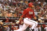 PHOENIX - AUGUST 30:  Brandon Allen #25 of the Arizona Diamondbacks bats against the Houston Astros during the major league baseball game at Chase Field on August 30, 2009 in Phoenix, Arizona. The Diamondbacks defeated the Astros 4-3.  (Photo by Christian Petersen/Getty Images)
