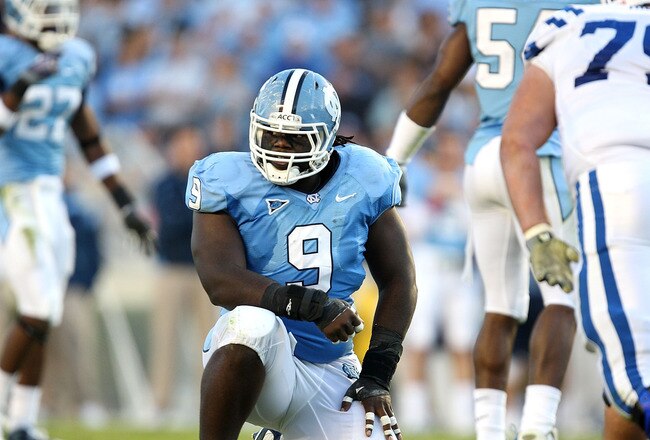 CHAPEL HILL, NC - NOVEMBER 07:  Marvin Austin #9 of the North Carolina Tar Heels watches on against the Duke Blue Devils during their game at Kenan Stadium on November 7, 2009 in Chapel Hill, North Carolina.  (Photo by Streeter Lecka/Getty Images)
