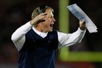LOS ANGELES, CA - NOVEMBER 28:  UCLA Bruins head coach Rick Neuheisel reacts to a call in the second half against the USC Trojans at the Los Angeles Memorial Coliseum on November 28, 2009 in Los Angeles, California. USC defeated UCLA 28-7.  (Photo by Jeff Gross/Getty Images)