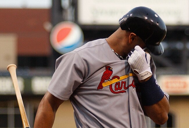 PITTSBURGH - MAY 07:  Albert Pujols #5 of the St Louis Cardinals walks back to the dugout after striking out against the Pittsburgh Pirates during the game on May 7, 2010 at PNC Park in Pittsburgh, Pennsylvania.  (Photo by Jared Wickerham/Getty Images)