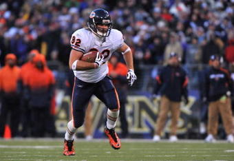BALTIMORE - DECEMBER 20:  Greg Olsen #82 of the Chicago Bears runs the ball during the game against the Baltimore Ravens at M&T Bank Stadium on December 20, 2009 in Baltimore, Maryland. The Ravens defeated the Bears 31-7. (Photo by Larry French/Getty Images)