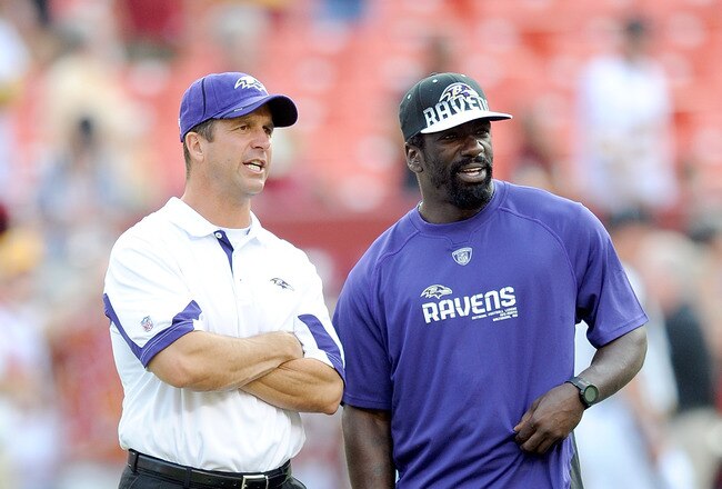 LANDOVER, MD - AUGUST 21:  Head coach John Harbaugh and Ed Reed #20 of the Baltimore Ravens talk before the preseason game against the Washington Redskins at FedExField on August 21, 2010 in Landover, Maryland.  (Photo by Greg Fiume/Getty Images)