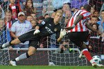 SUNDERLAND, ENGLAND - AUGUST 29: Darren Bent of Sunderland scores a penalty past Joe Hart of Manchester City during the Barclays Premier League match between Sunderland and Manchester City at the Stadium of Light on August 29, 2010 in Sunderland, England.  (Photo by Michael Regan/Getty Images)