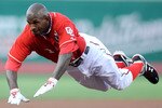 WASHINGTON - JULY 30:  Nyjer Morgan #1 of the Washington Nationals slides into third base with a triple in the first inning against the Philadelphia Phillies at Nationals Park on July 30, 2010 in Washington, DC.  (Photo by Greg Fiume/Getty Images)