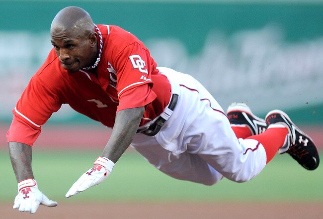WASHINGTON - JULY 30:  Nyjer Morgan #1 of the Washington Nationals slides into third base with a triple in the first inning against the Philadelphia Phillies at Nationals Park on July 30, 2010 in Washington, DC.  (Photo by Greg Fiume/Getty Images)