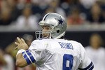 HOUSTON - AUGUST 28:  Quarterback Tony Romo #9 of the Dallas Cowboys looks for a receiver against the Houston Texans in a preseason game at Reliant Stadium on August 28, 2010 in Houston, Texas.  (Photo by Bob Levey/Getty Images)