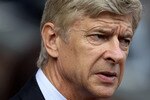 BLACKBURN, ENGLAND - AUGUST 28:  Arsenal Manager Arsene Wenger looks on during the Barclays Premier League match between Blackburn Rovers and Arsenal at Ewood Park on August 28, 2010 in Blackburn, England.  (Photo by Clive Brunskill/Getty Images)