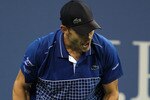 NEW YORK - SEPTEMBER 01:  Andy Roddick of the United States reacts after a point against Janko Tipsarevic of Serbia during his second round men's singles match on day three of the 2010 U.S. Open at the USTA Billie Jean King National Tennis Center on September 1, 2010 in the Flushing neighborhood of the Queens borough of New York City.  (Photo by Al Bello/Getty Images)