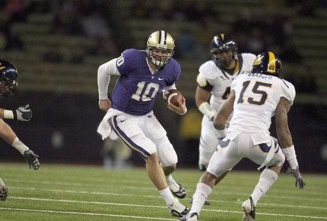 SEATTLE - DECEMBER 05:  Quarterback Jake Locker #10 of the Washington Huskies runs the ball during game against the California Bears on December 5, 2009 at Husky Stadium in Seattle, Washington. The Huskies defeated the Bears 42-10. (Photo by Otto Greule Jr/Getty Images)